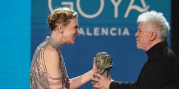 Australian-US actress Cate Blanchett receives an International Goya award from Spanish film director Pedro Almodovar at the 36th Goya awards ceremony at the Palau de les Arts in Valencia, on February 12, 2022. (Photo by JOSE JORDAN / AFP)