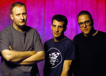 1995 --- Bob Mould (far left) stands with the members of his band Sugar. --- Image by © Steve Jennings/CORBIS